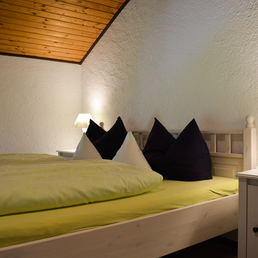 Bett im Doppelzimmer Hollerbeerl